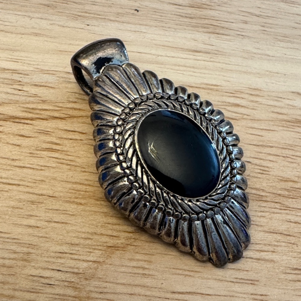 Elegant Black and Silver Toned Pendant